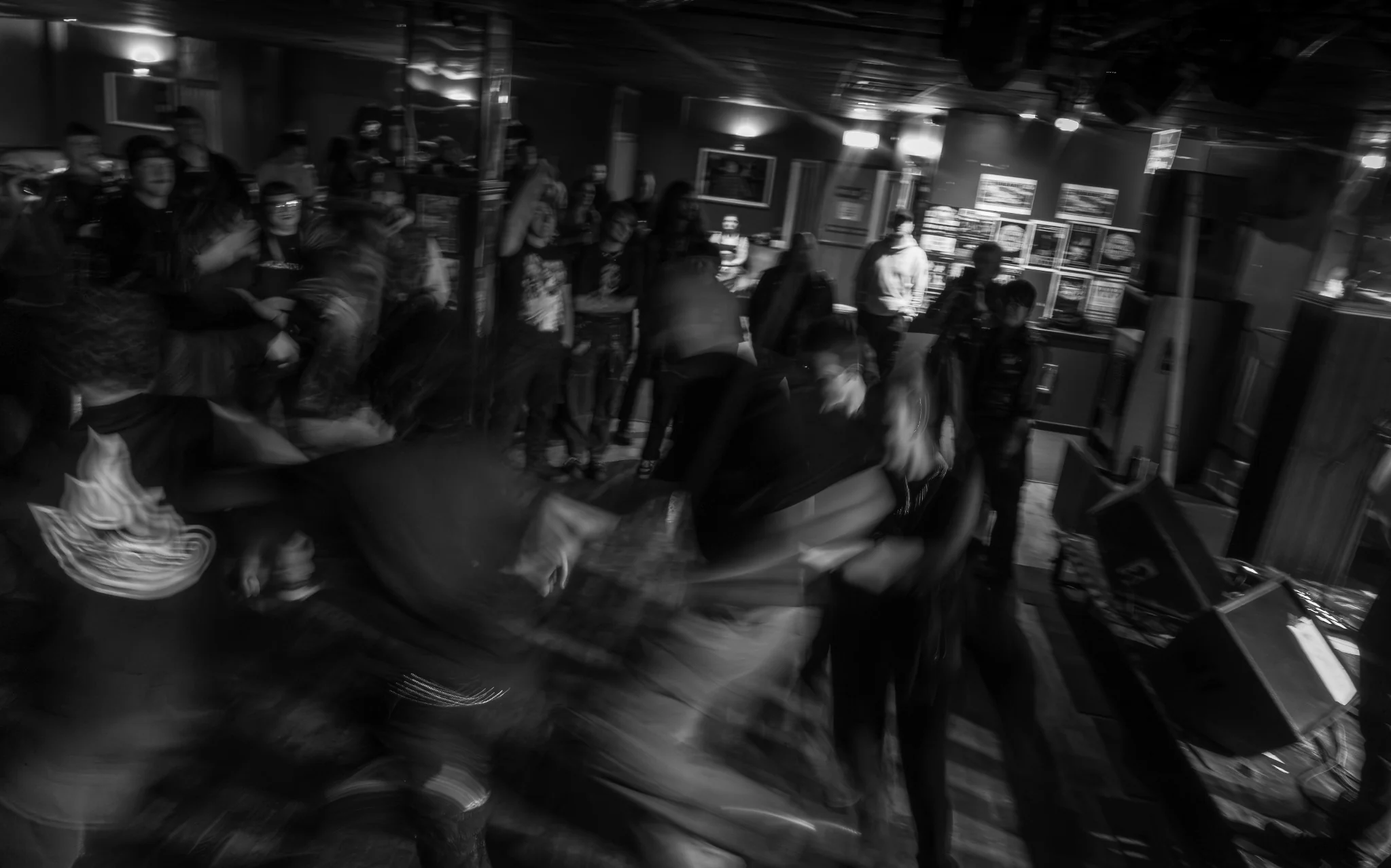 Crowd movement captured with intentional motion blur in black and white