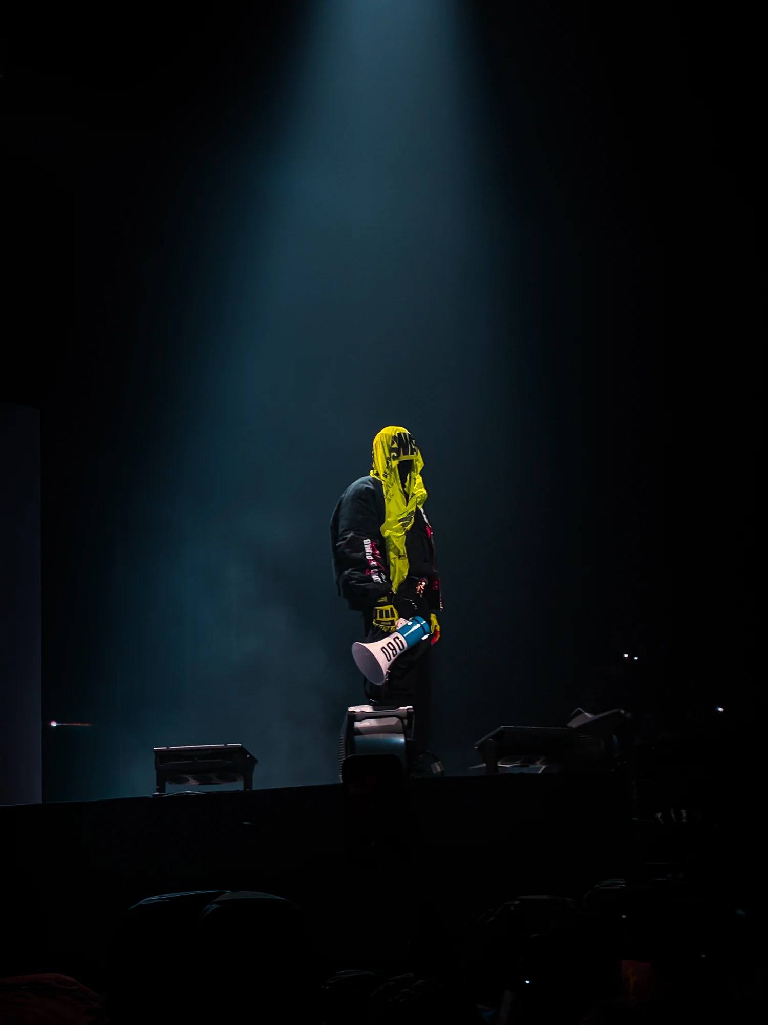 A$AP Rocky performing under a spotlight at The O2, London